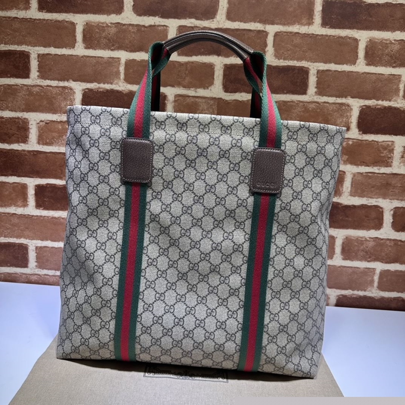 G*u*i shopping bags